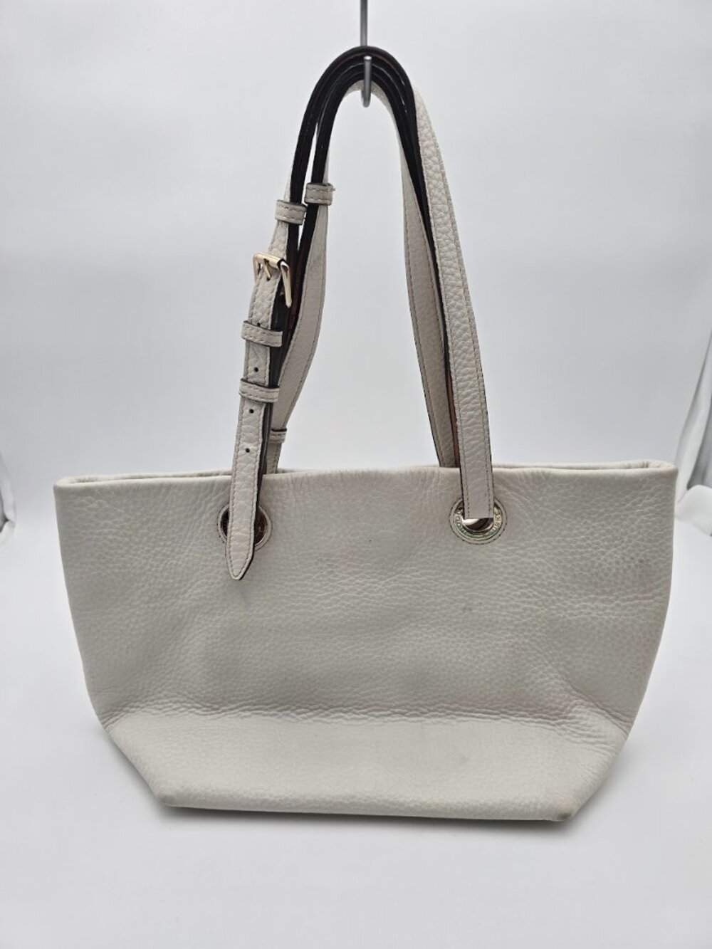 Dooney & Bourke Medium East West Grommet Shopper shoulder tote bag.